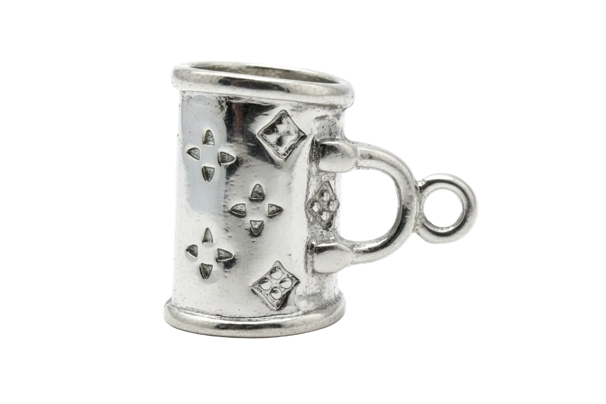 Polished silver-toned tankard mug charm with handle, studded band, and engraved diamond details