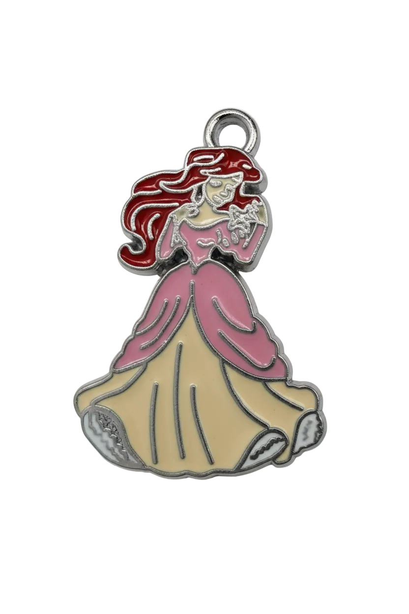 Glossy enamel mermaid with red hair, pink fin details, and beige tail, outlined in silver