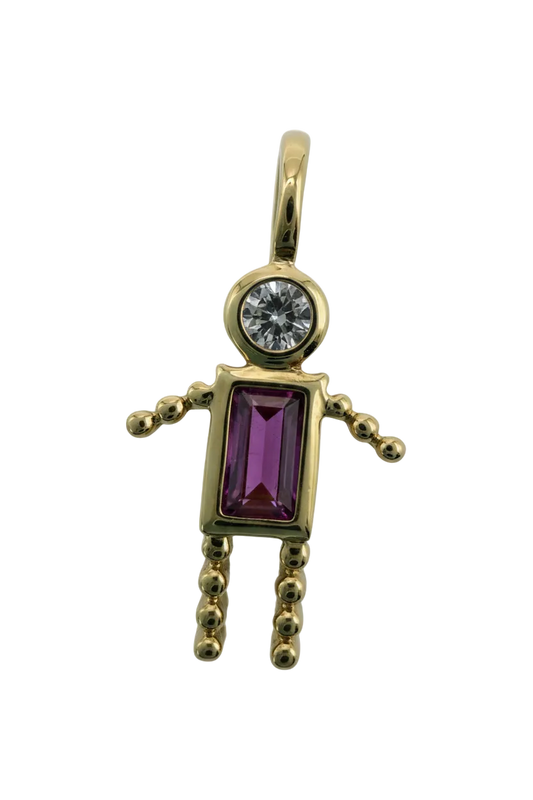 Gold key silhouette with rectangular purple gem and round clear gem on a black background