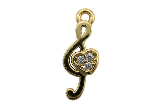 Gold pin-shaped piece with a heart center and three clear crystals