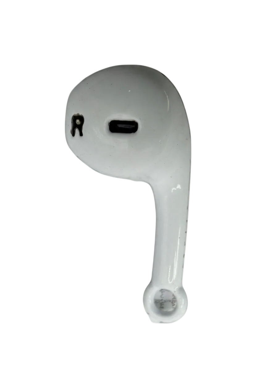 Glossy white wireless earbud charm with black detailing on a black background