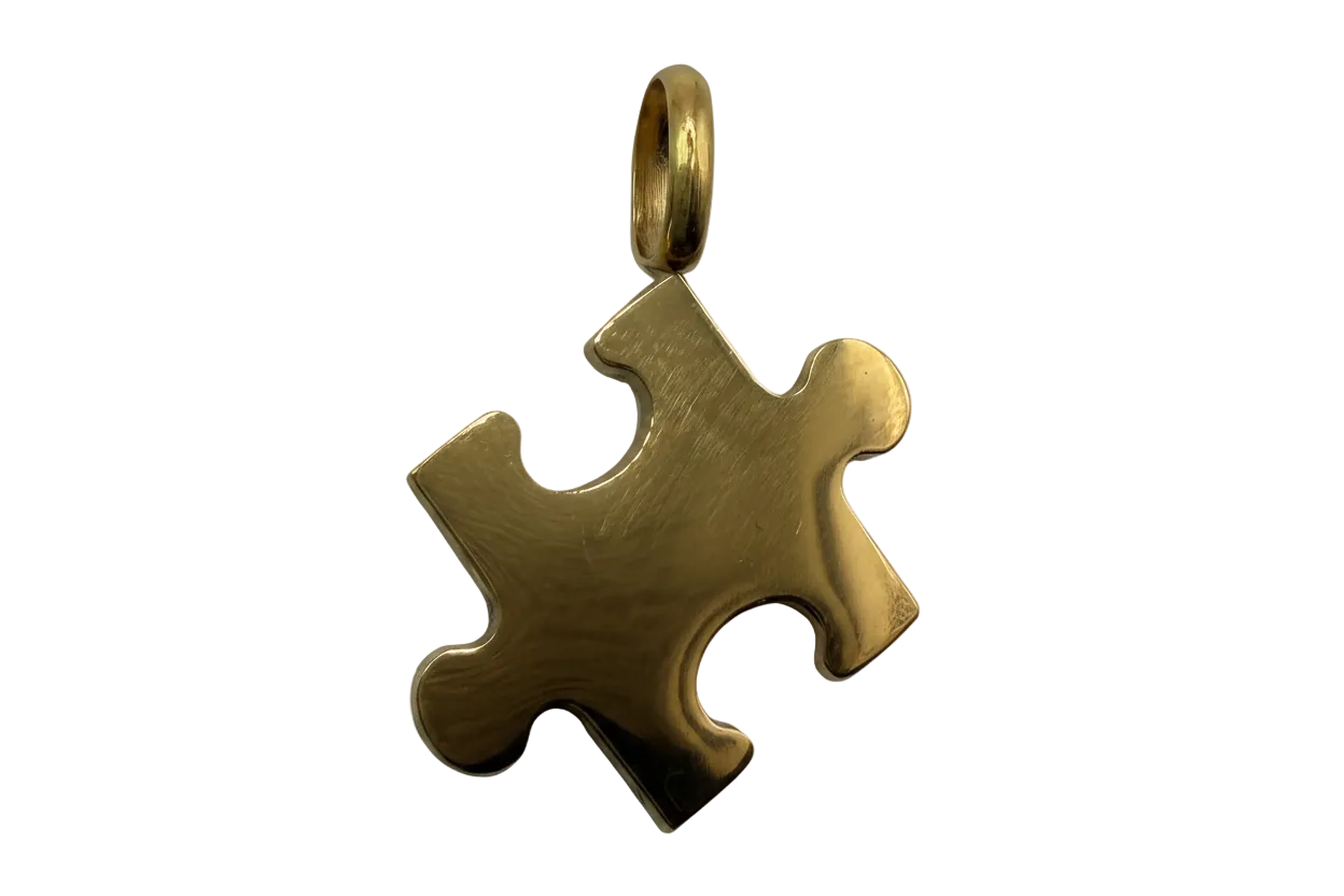 Brushed gold jigsaw puzzle piece pendant with satin finish