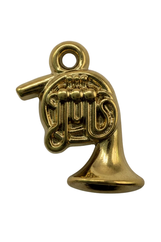 Polished gold French horn charm with detailed coils and flared bell