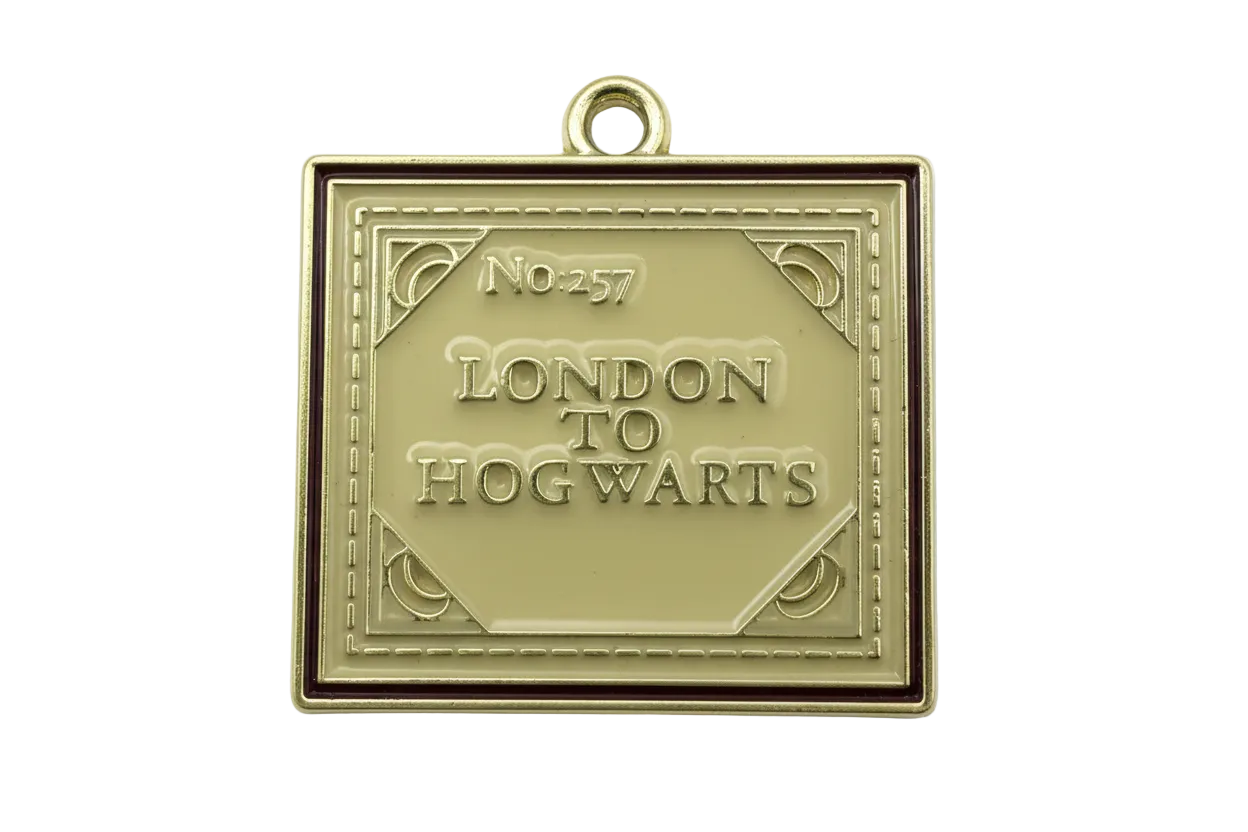 Gold book charm with glossy ivory enamel cover, raised lettering, and burgundy border