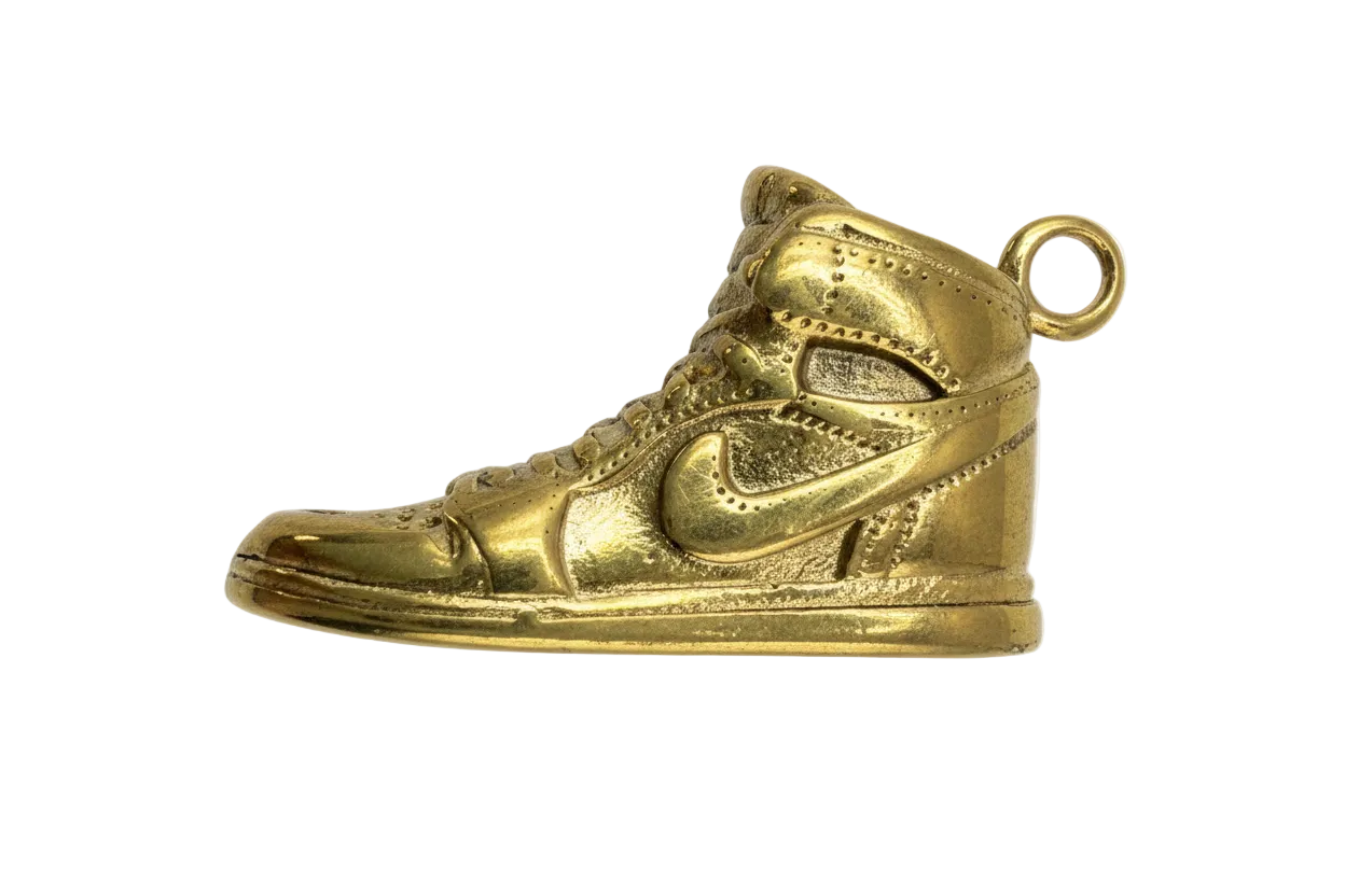Gold high-top sneaker charm with embossed lace and panel details