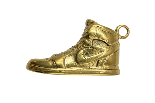 Gold high-top sneaker charm with embossed lace and panel details