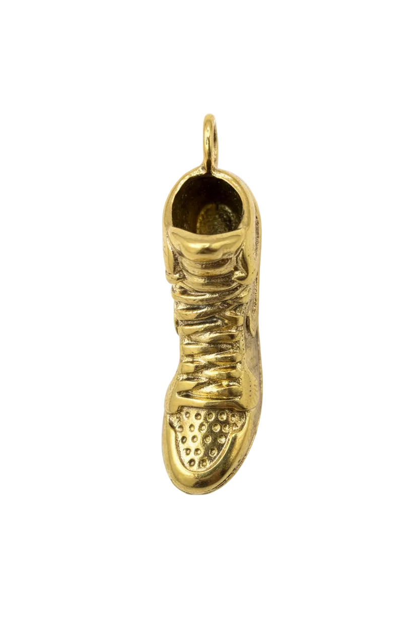 Glossy gold sneaker shoe charm with textured sole and lace details