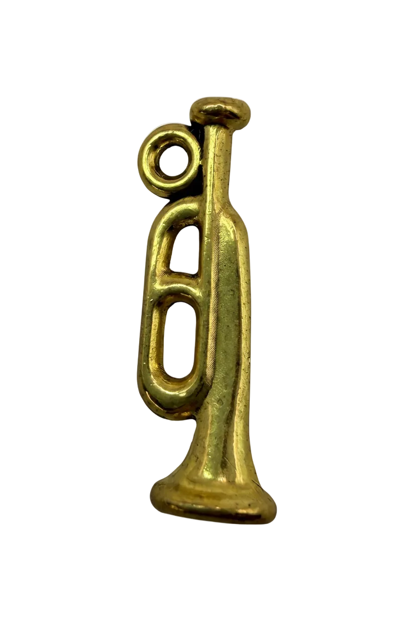 Gold trumpet silhouette charm with a softly antiqued finish