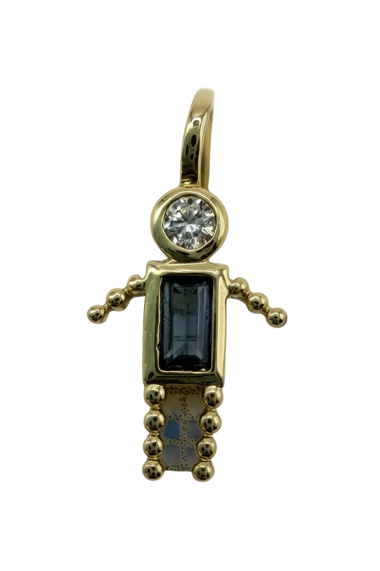Gold pistol charm with navy rectangular gem, clear round gem, and ivory enamel accents