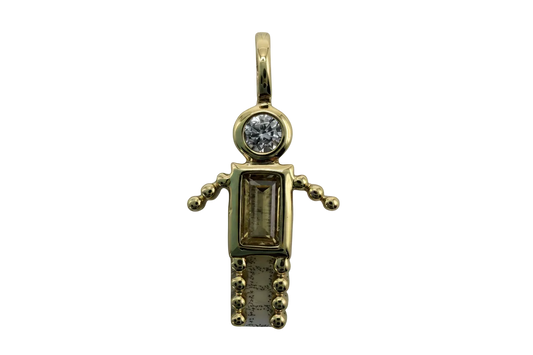 Gold gecko charm with clear round gem and smoky rectangular gem on black background