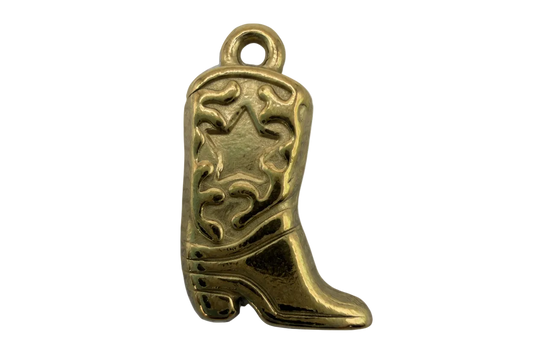 Gold engraved pistol charm with raised scrollwork and star detail