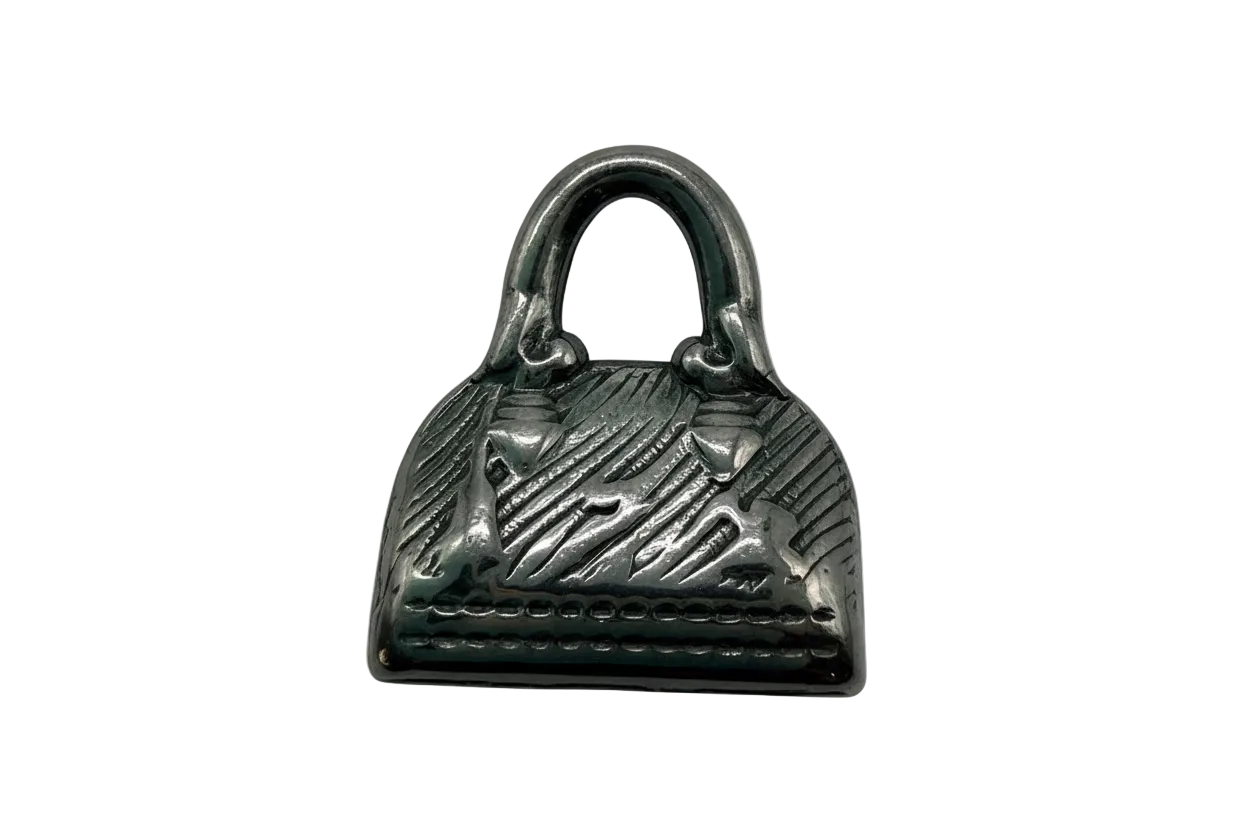 Silver-tone textured handbag charm with crosshatch detail and double handle