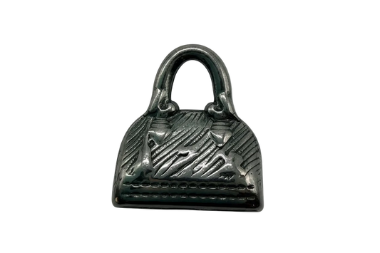 Silver-tone textured handbag charm with crosshatch detail and double handle
