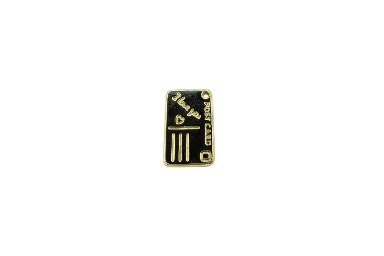 Gold-tone bullion bar tag with raised lettering