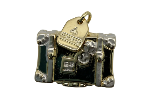 Two-tone suitcase trunk charm with glossy black panels, gold tag detail, and silver corner accents