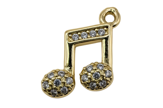 Gold music note charm with clear crystal pavé accents