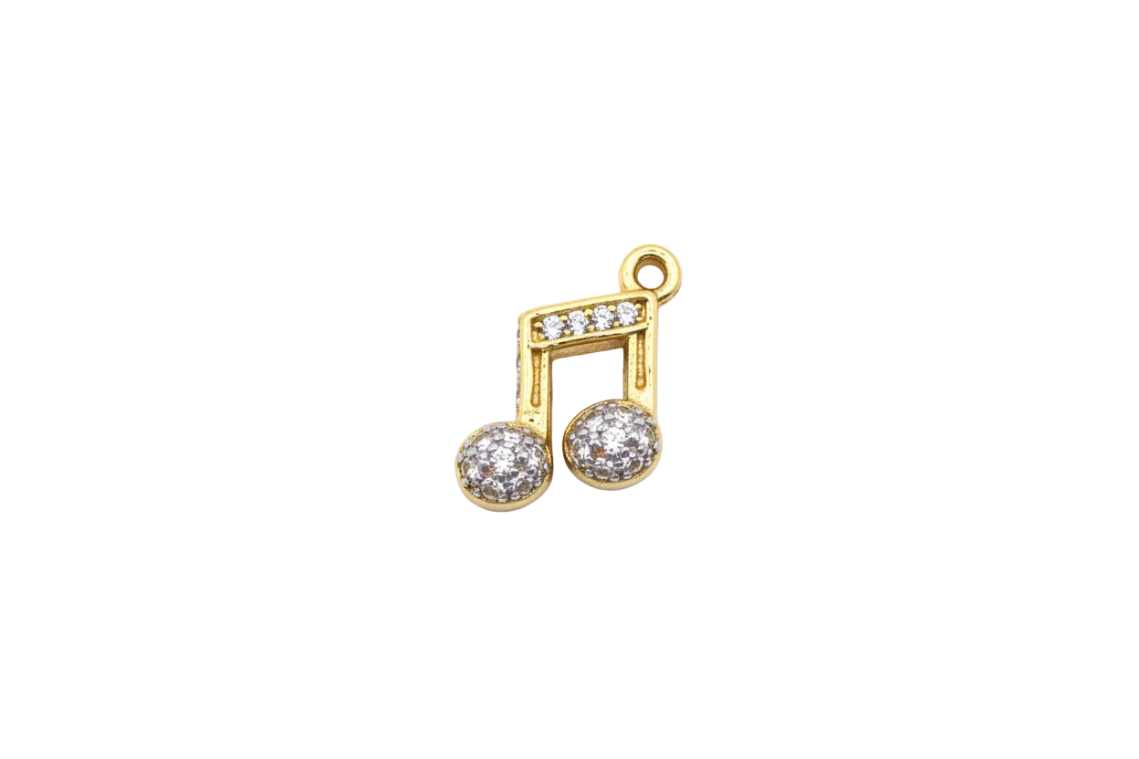 Gold music note with clear crystal pavé accents