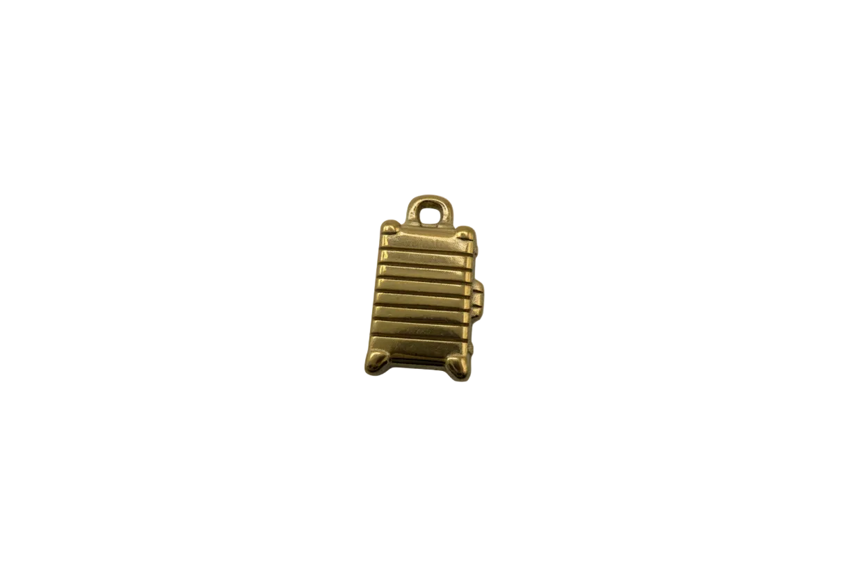 Gold ridged suitcase with handle and wheel details
