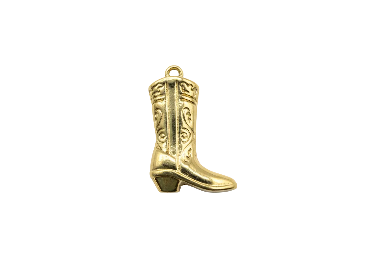Gold engraved cowboy boot pendant with scrollwork