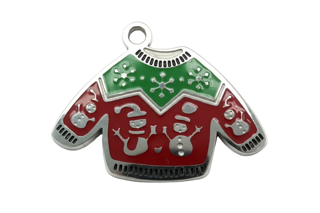 Red and green enamel holiday sweater with silver finish and snowflake detailing