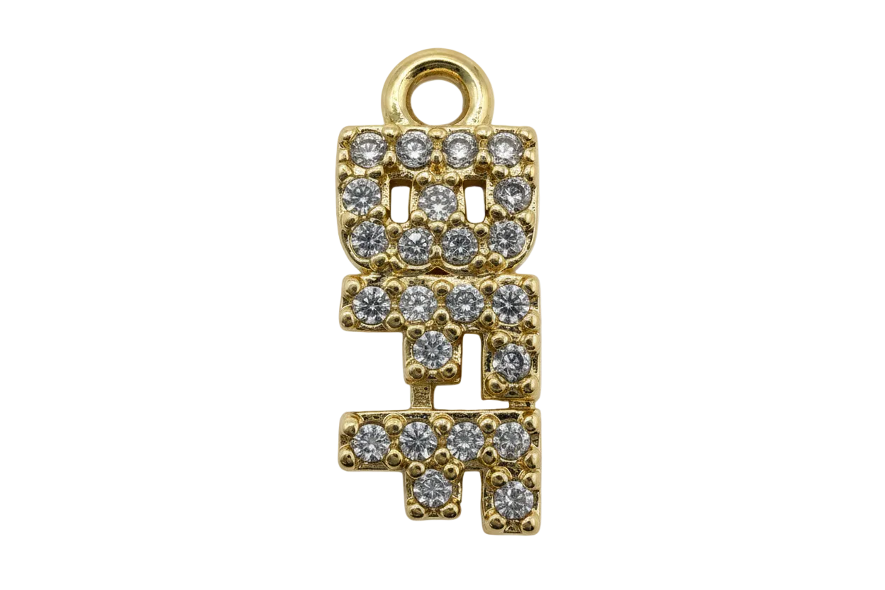 Gold pavé initial letter charm with clear round stones