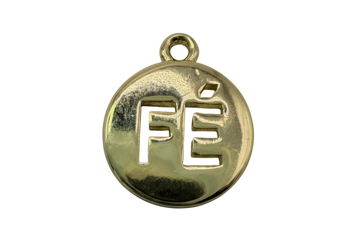 Polished gold round coin charm with raised FE initials and ivory speckled inlay