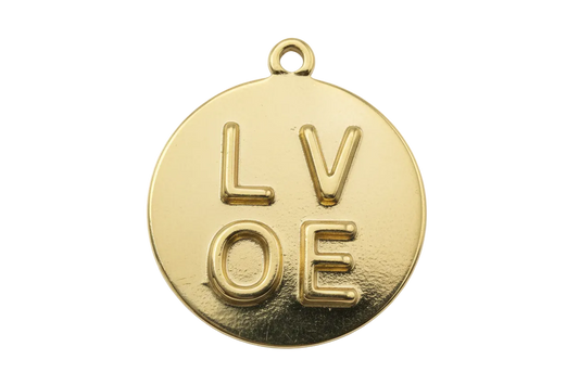 Gold round medallion with raised LOVE lettering on a textured background