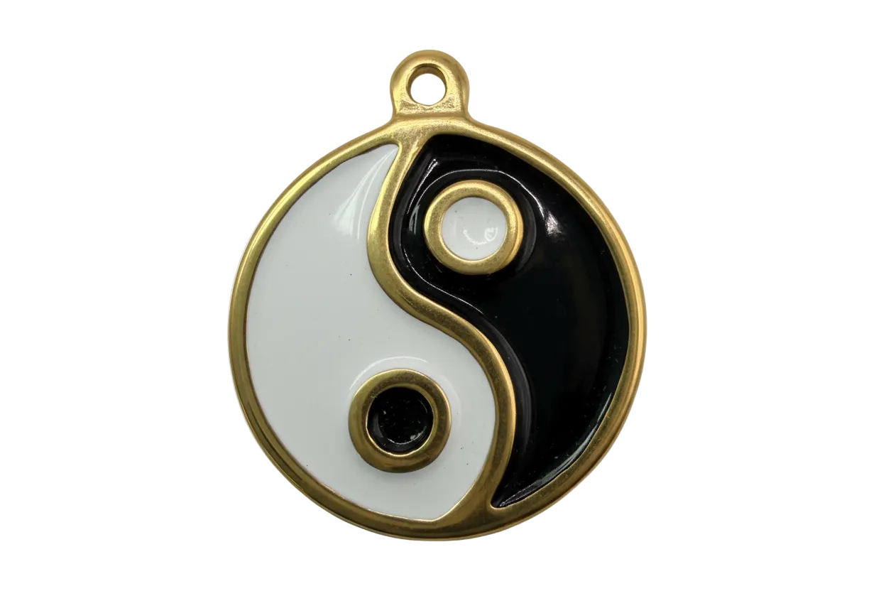 Gold-framed yin-yang disc with glossy black and white enamel