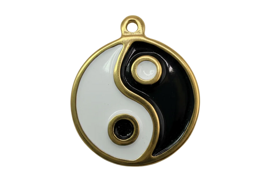 Gold-framed yin-yang disc with glossy black and white enamel