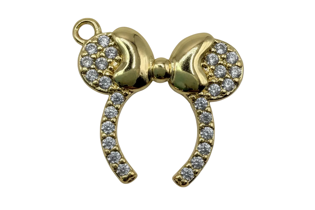 Gold horseshoe with bow accented by pavé clear gems
