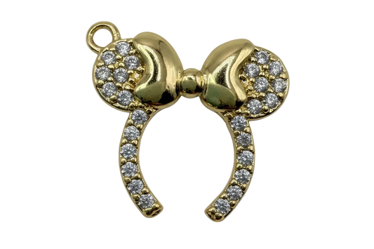 Gold horseshoe with bow accented by pavé clear gems
