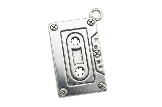 Polished silver cassette tape charm with engraved reel and screw details