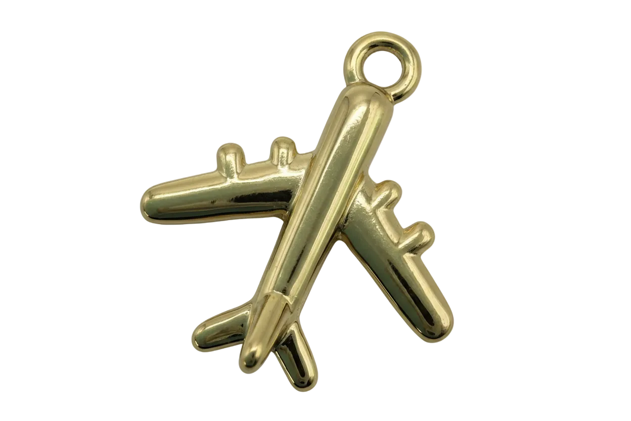 Polished gold airplane silhouette charm with glossy, rounded details