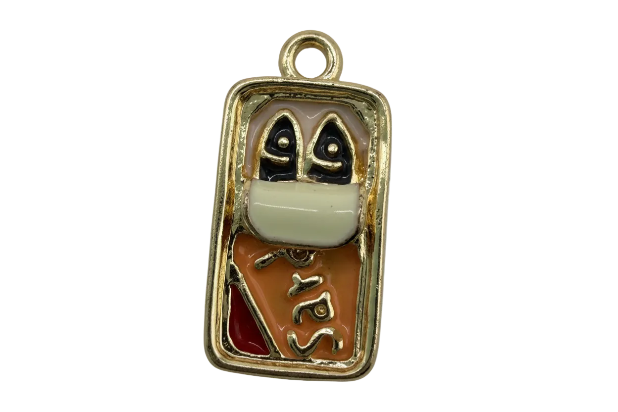 Gold rectangular enamel sushi motif with black and white details and orange-red accents