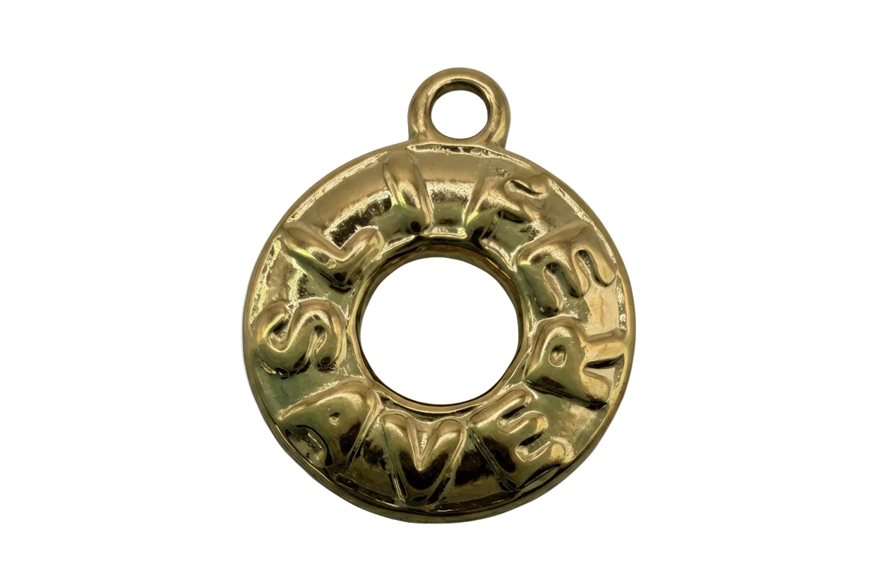Polished gold donut-shaped charm with raised SWEET lettering around the ring