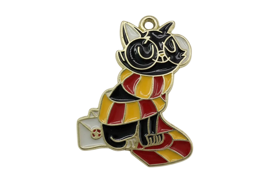 Glossy enamel black cat with red and yellow striped scarf and small envelope, gold outline