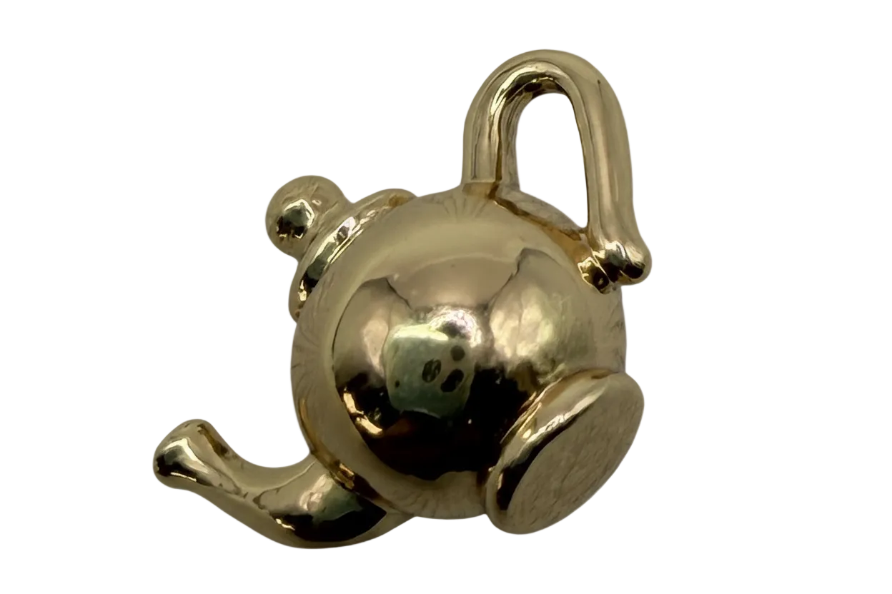 Polished gold seated bear figure with mirror-like shine