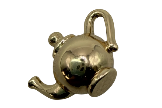 Polished gold seated bear figure with mirror-like shine