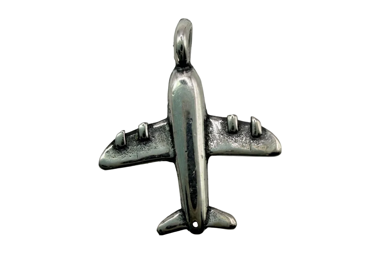 Polished silver-tone airplane pendant with sculpted wings and oxidized detailing