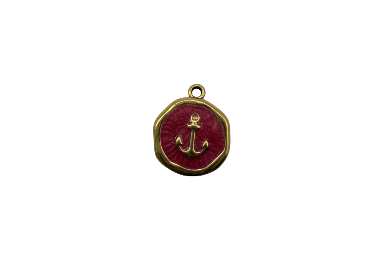 Gold anchor medallion with glossy red enamel