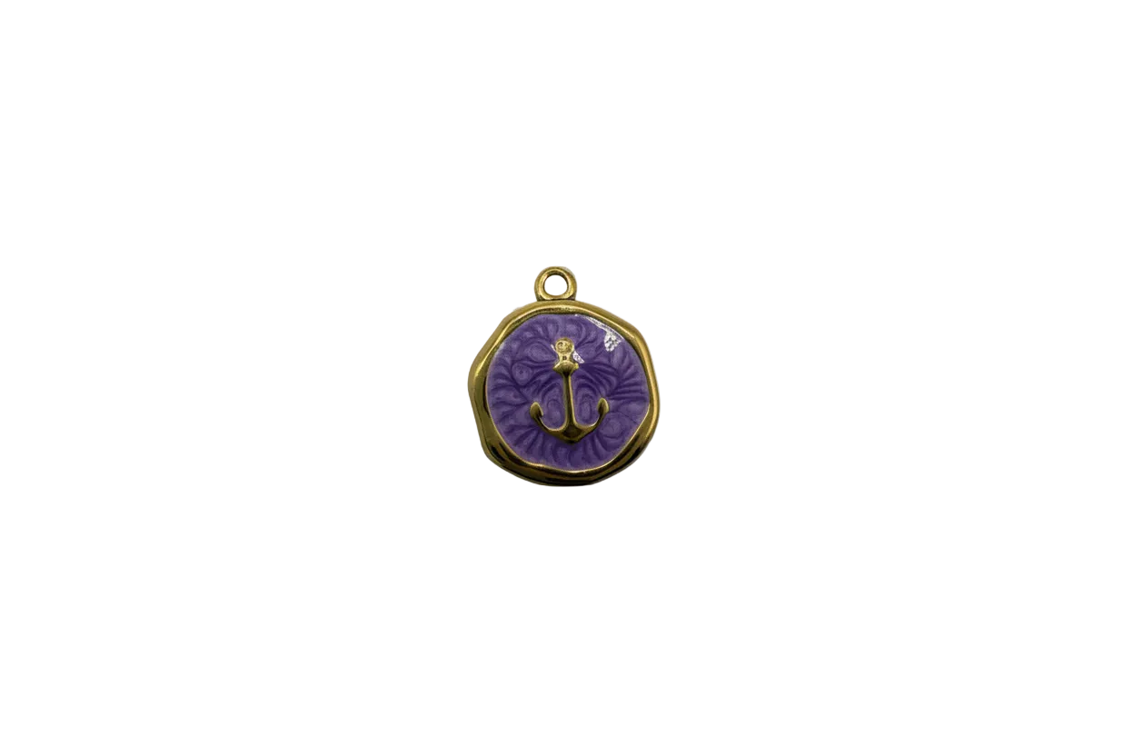 Gold anchor coin on marbled purple enamel