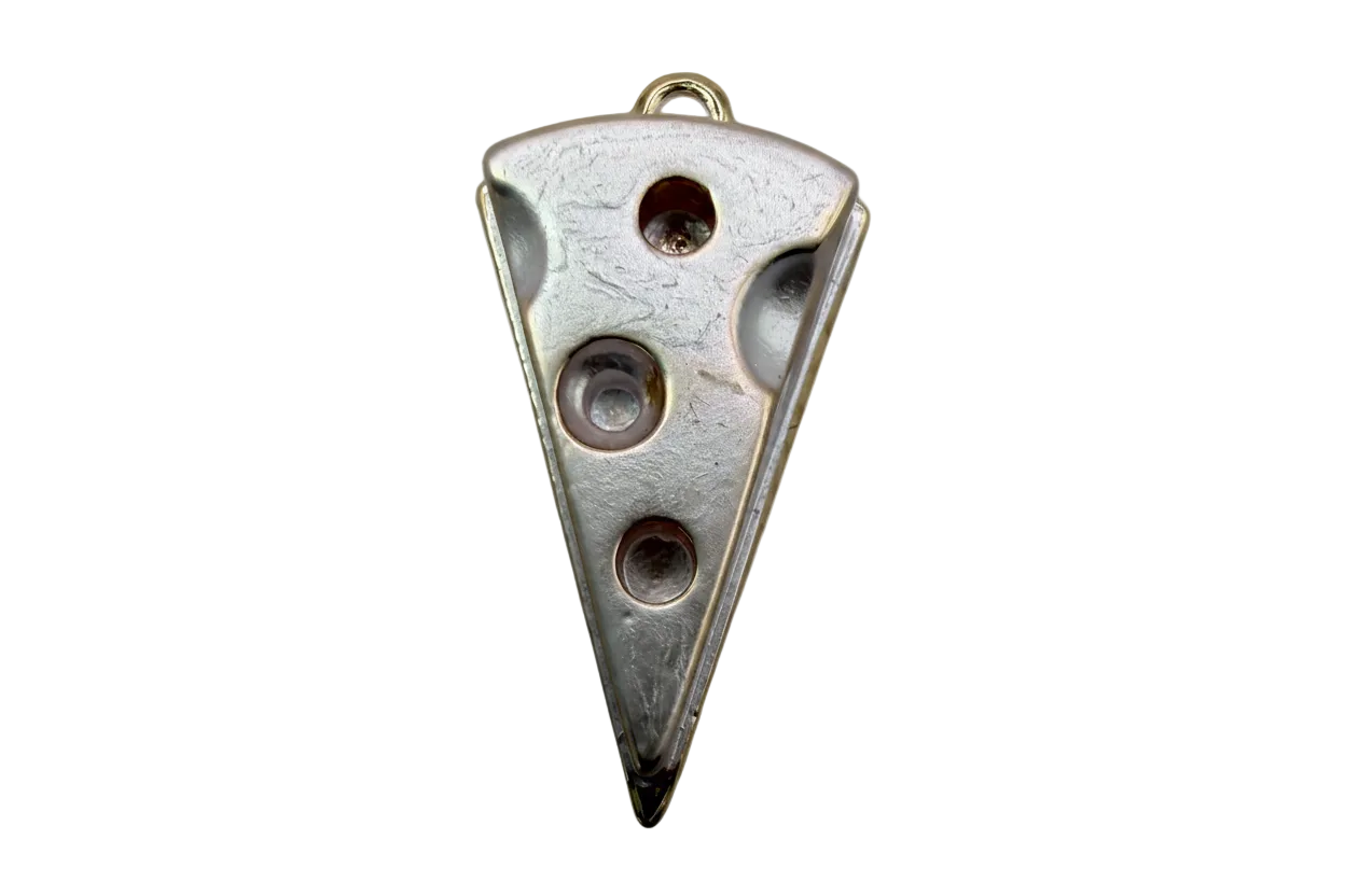 Ivory enamel Swiss cheese slice with gold outline and cutout holes