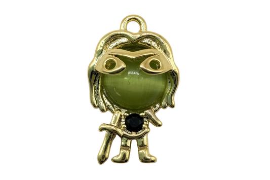Gold figure charm with green cat-eye face and faceted black gem accent