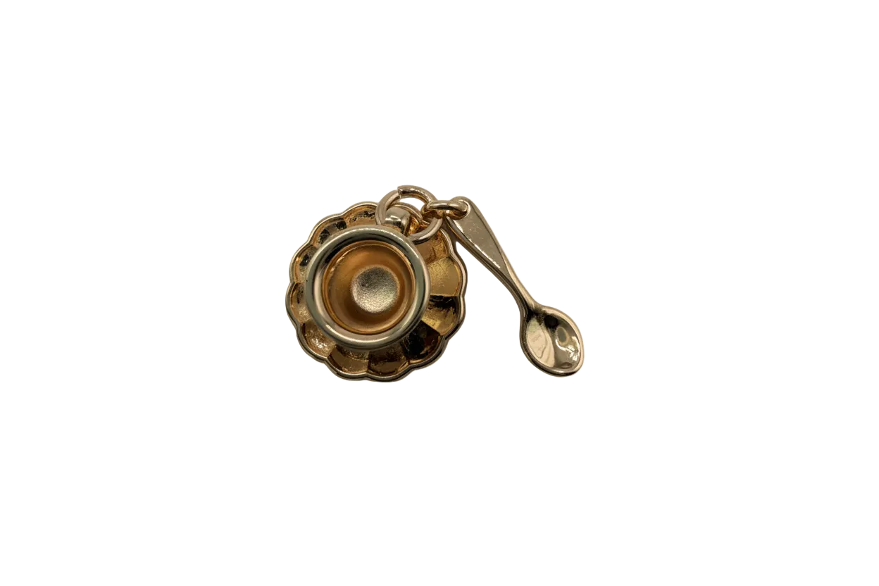 Gold scalloped bowl with spoon charm