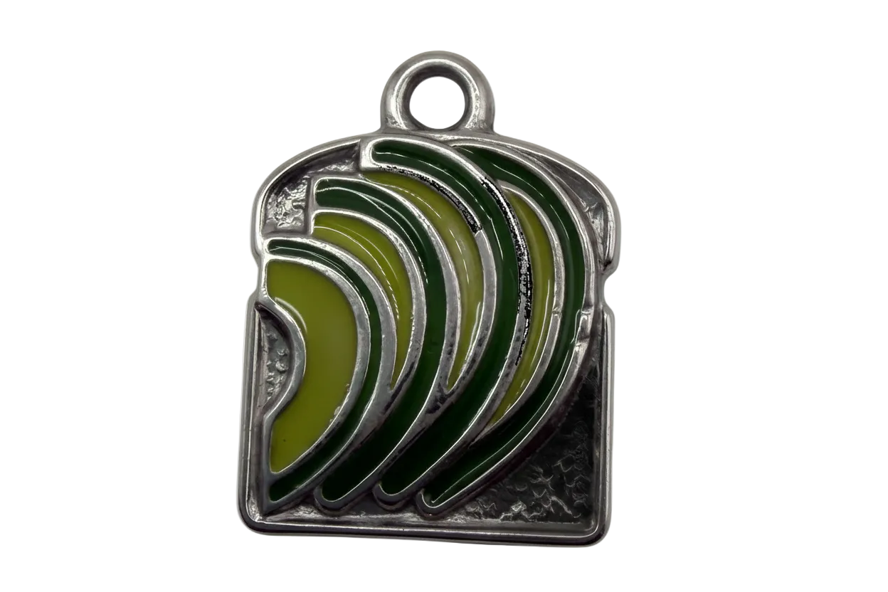 Silver-tone rectangular plaque with layered green leaf enamel design