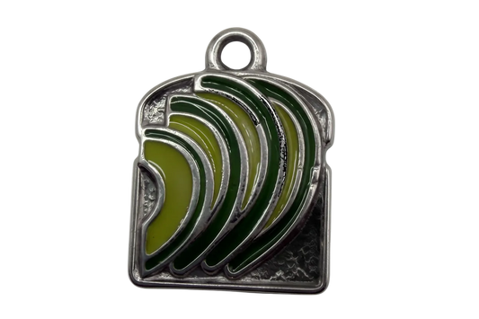Silver-tone rectangular plaque with layered green leaf enamel design