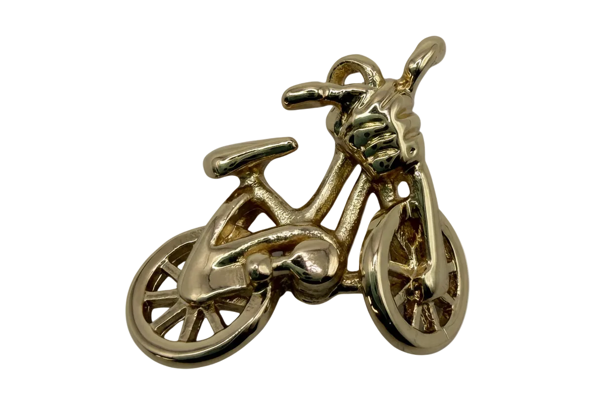 High-shine gold mini bicycle charm with detailed spokes and handlebars on black background