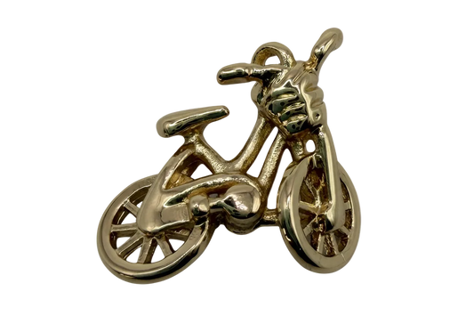 High-shine gold mini bicycle charm with detailed spokes and handlebars on black background