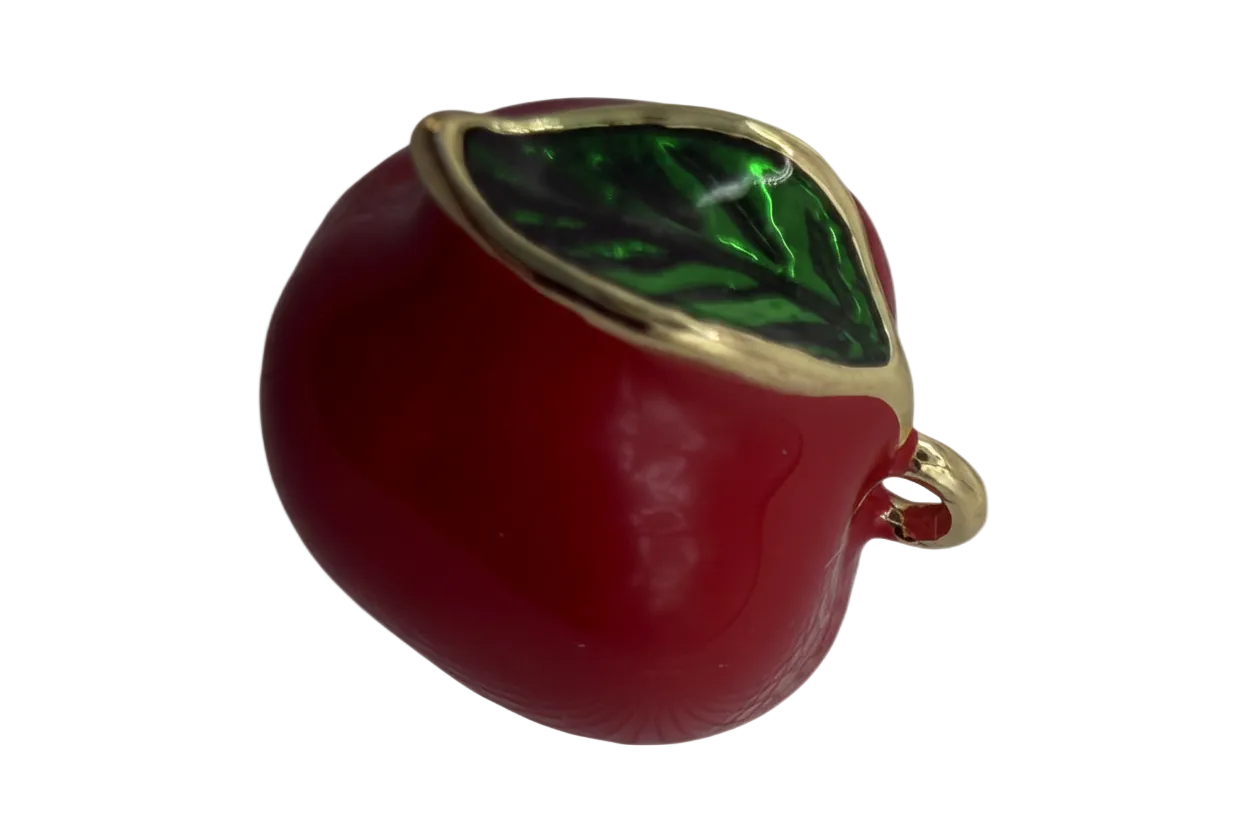 Glossy red apple charm with a green leaf gem and gold trim