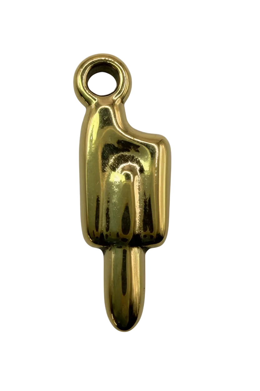 Glossy gold raised middle finger hand gesture pendant on black background